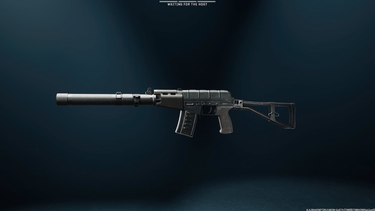 Black assault rifle with suppressor